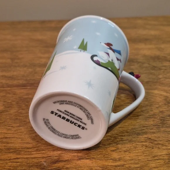 STARBUCKS 2011 Festive Holiday Skaters and Sledding Dog Mug with 3D Airplane - Picture 6 of 15